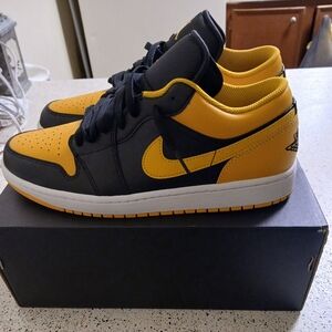 Jordan 1 Low Black and Yellow